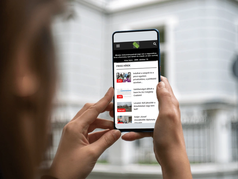 woman-holding-smartphone-mockup-1920x1440.png